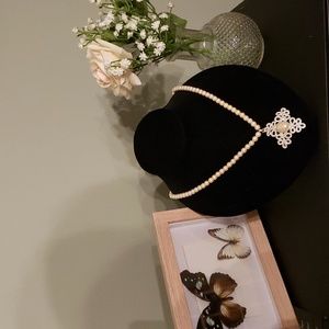 Liz and co. Faux pearl and Silvertone cross necklace